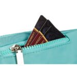 Saszetka sportowa wykonana z poliestru w miętowym kolorze, zamykana na suwak - Peterson-8